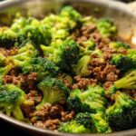 Close-up of a Keto Hamburger Broccoli Skillet in a pan, showing seasoned ground beef and bright green broccoli florets.