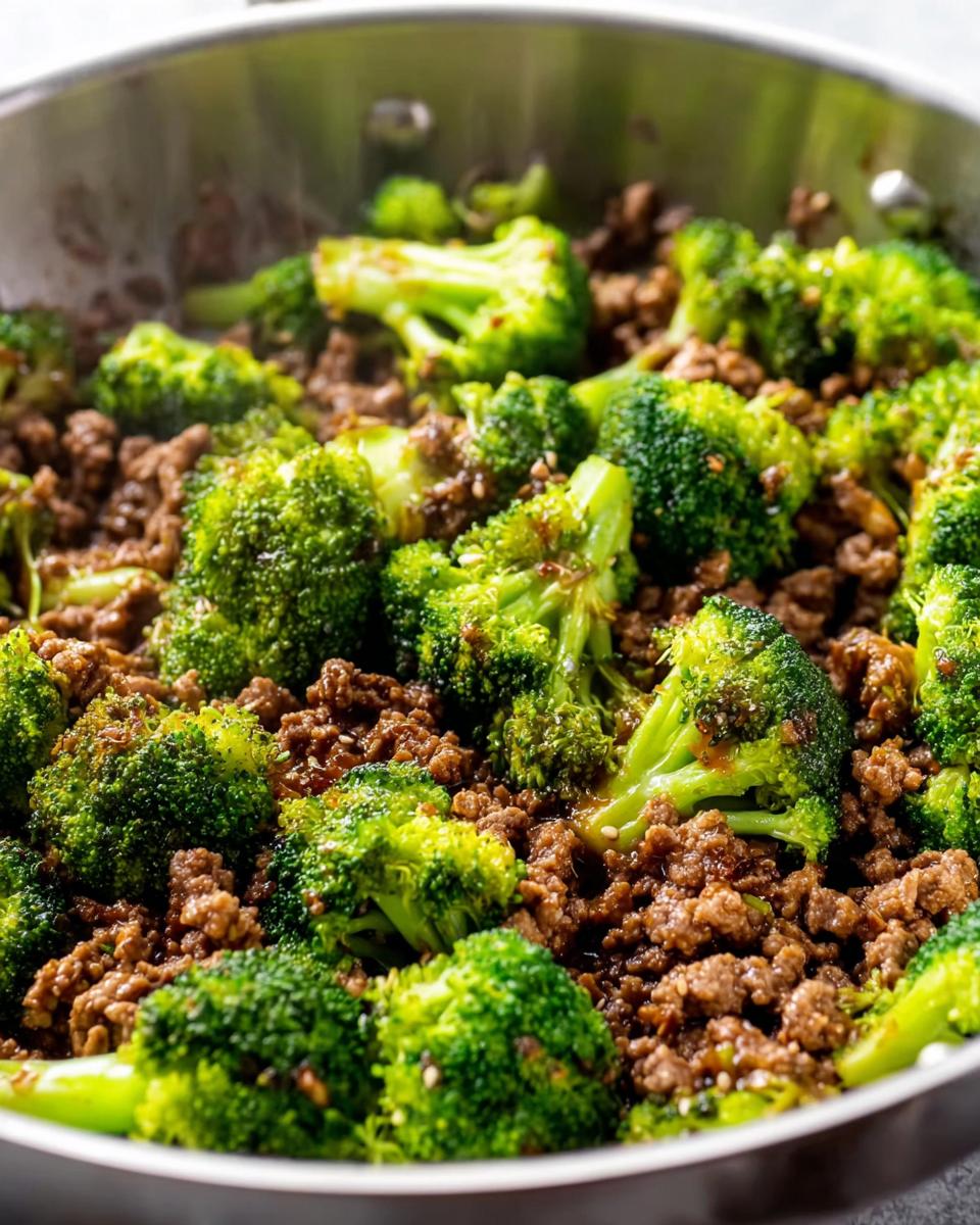 Close-up of a Keto Hamburger Broccoli Skillet, showing seasoned ground beef mixed with vibrant green broccoli florets.